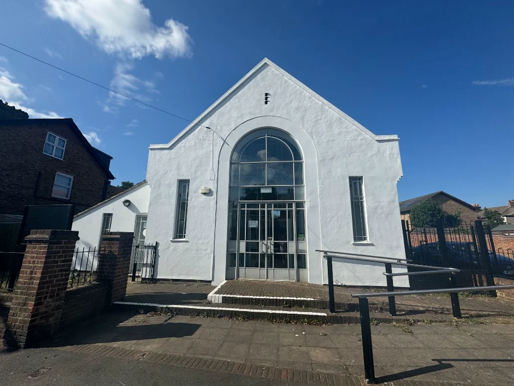 The Salvation Army Community Centre Carshalton - bright white building with arched entrance for watercolour workshop venue